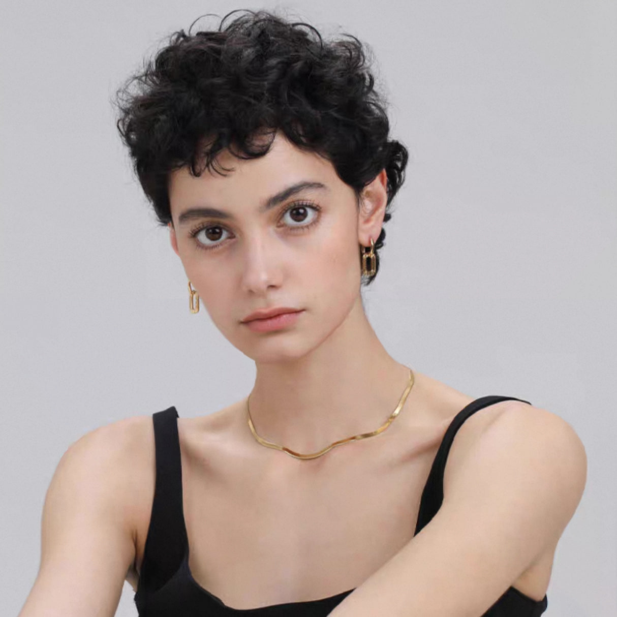 Minimalist snake chain choker Necklace waterproof worn by a model, showcasing its sleek design and shine.