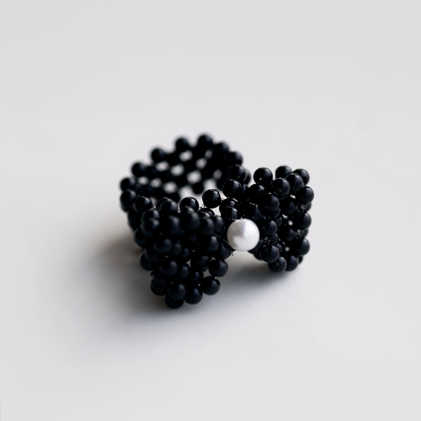 Pearl Bow Ring – Adjustable Elastic Design